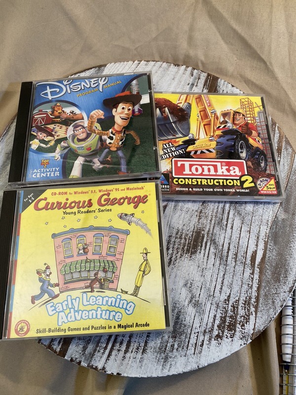 CD Rom, 3, Toy Story 2, Tonka Construction 2, and Curious George