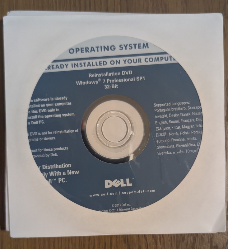 New sealed Dell Windows 7 Professional SP1 32 Bit Reinstallation DVD P/N 04DTND