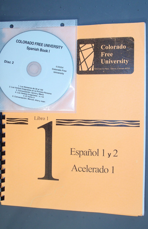 Spanish language instruction software 2 CDs; Colorado Free Uni Book 1 + workbook
