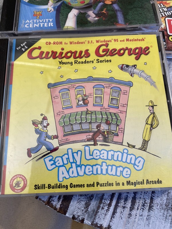 CD Rom, 3, Toy Story 2, Tonka Construction 2, and Curious George gallery