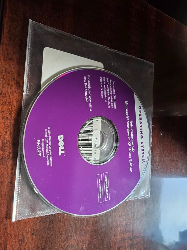 Dell Operating System Reinstallation CD Windows XP Home Edition.