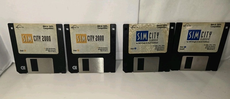 Sims City 2000 & Classic Wheel Of Fortune Solitaire Kiloblaster 3.5″ Floppy Disk