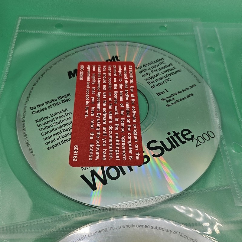Microsoft Works Suite 2000 - Complete 7 Disc PC CD-ROM Excellent Condition VG+ gallery