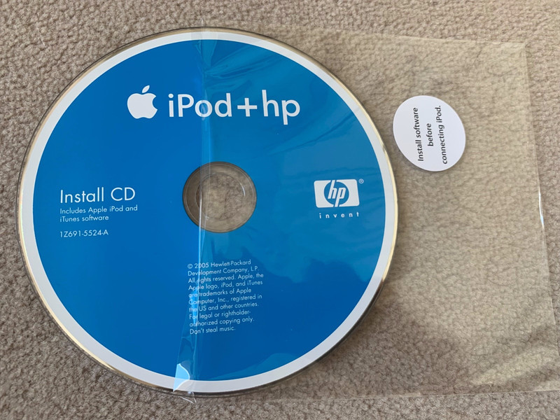 Apple iPod + hp Install CD includes Apple iPod and iTunes software 2005