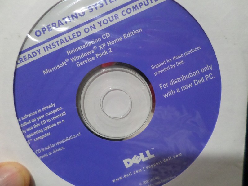 LOT OF 3 - 2006 DELL OPERATING SYSTEM / APPLICATION / DRIVERS & UTILITIES DISCS gallery