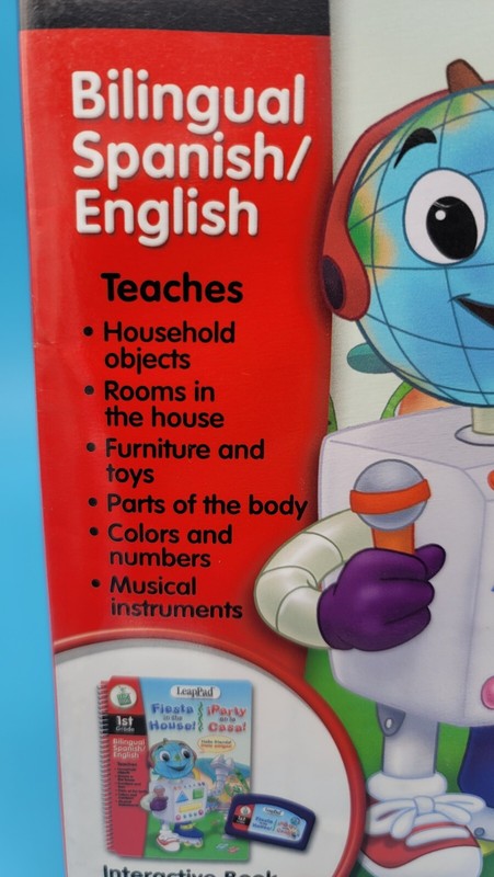 LeapPad 1st Grade Bilingual English Spanish Fiesta in the House Book & Cartridge gallery