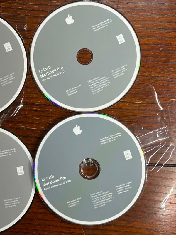 Apple 2010 MacBook Pro + Mac Mini Restore DVDs 4-Disc Lot Mac OS X Snow Leopard gallery