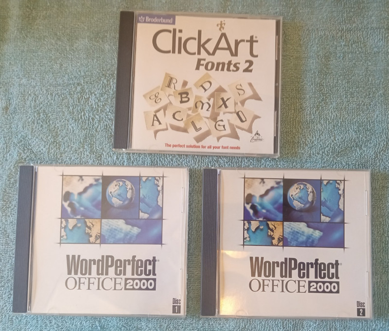 Corel WordPerfect Office 2000 – 2 CD’s And Broderbund Clickart Fonts CD