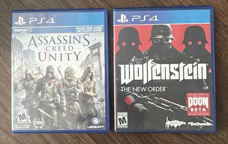 Lot Of (2) PS4 Games – Assassin’s Creed Unity And Wolfenstein The New Order