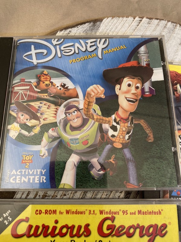 CD Rom, 3, Toy Story 2, Tonka Construction 2, and Curious George gallery