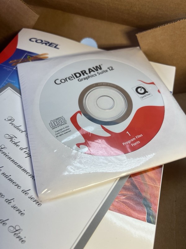 Corel CorelDRAW Graphics Suite 12 Upgrade CD for Windows 2000 XP Open Box gallery