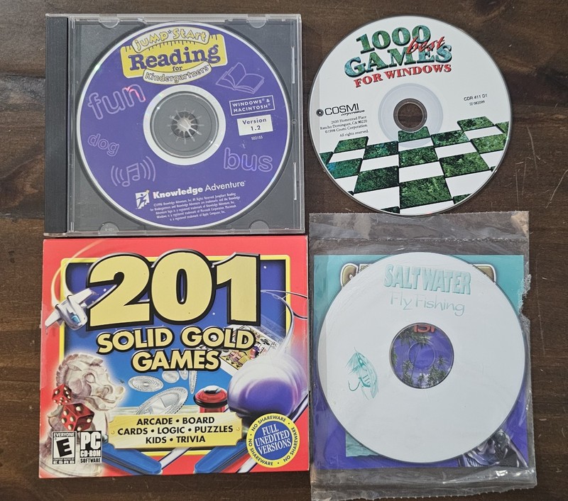 4 X PC CD ROMS Jumpstart, 1000 Best Games, Saltwater Fly Fishing, 201 Gold Games