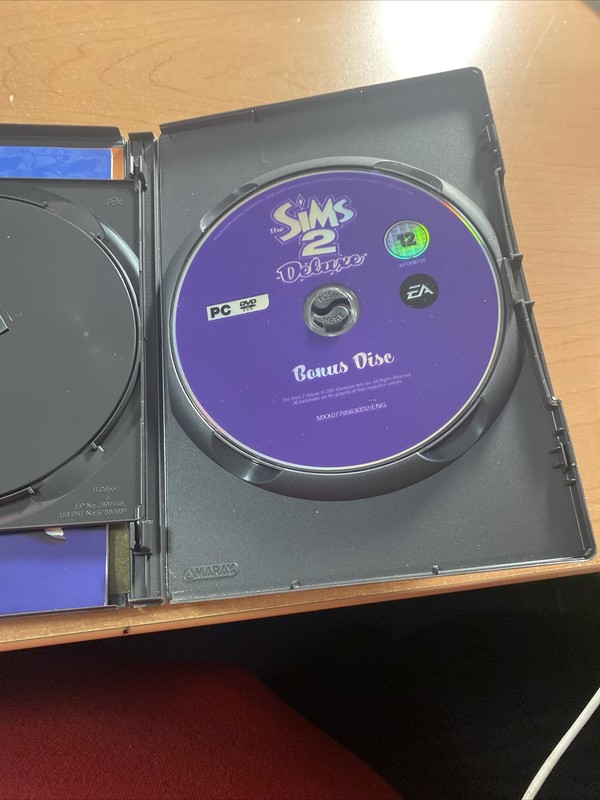 The Sims 2 Deluxe PC CD ROM, missing main game disc gallery