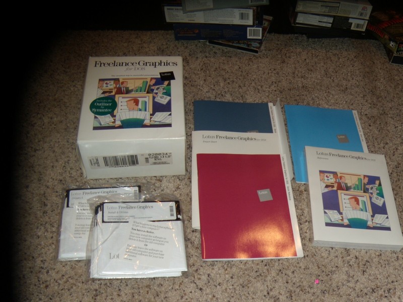 Freelance Graphics for DOS 5.25″ disks with pictured manuals and books