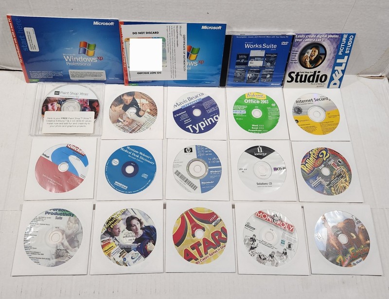 Huge Lot Of Software, Windows Xp PRO Microsoft Suite, Quicken, Games, Mavis ETC.
