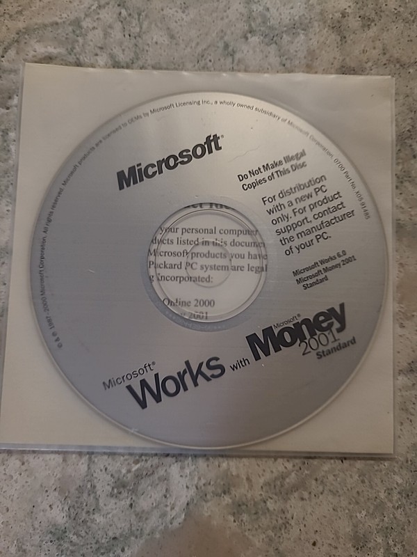 Microsoft Works Suite 2001 with Money (Includes Activation Code)