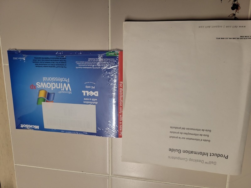 New Sealed Microsoft Windows XP Professional CD Version 2002 with manual