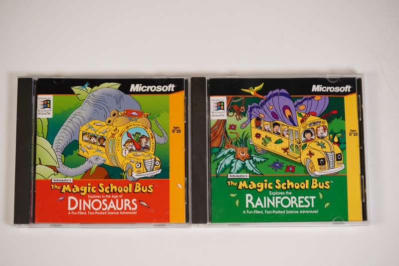 The Magic School Bus CD-ROM 2 Disk Lot Including Dinosaurs, And Rainforest