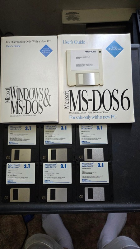 windows 3.1 floppy. DOS 6 boot disk and manuals