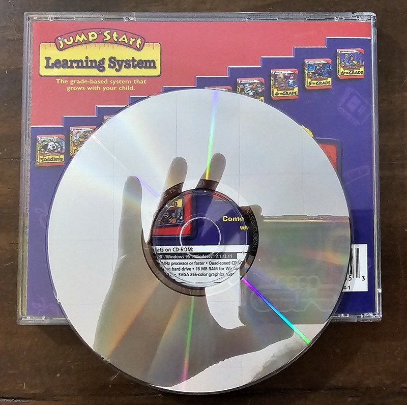 4 X PC CD ROMS Jumpstart, 1000 Best Games, Saltwater Fly Fishing, 201 Gold Games gallery