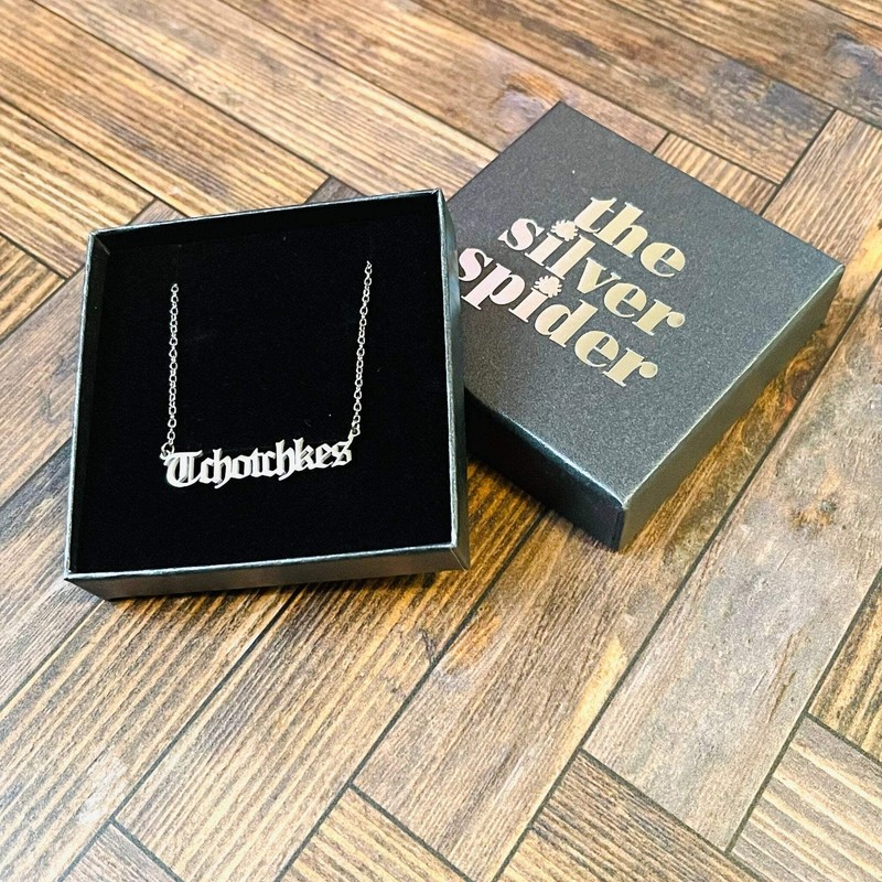 ‘Tchotchkes’ Gothic Lettering Necklace by The Silver Spider