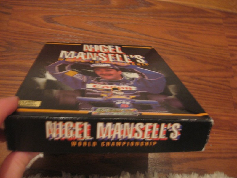 Nigel Mansell's World Championship CBM Amiga game with box and manual . Tested gallery