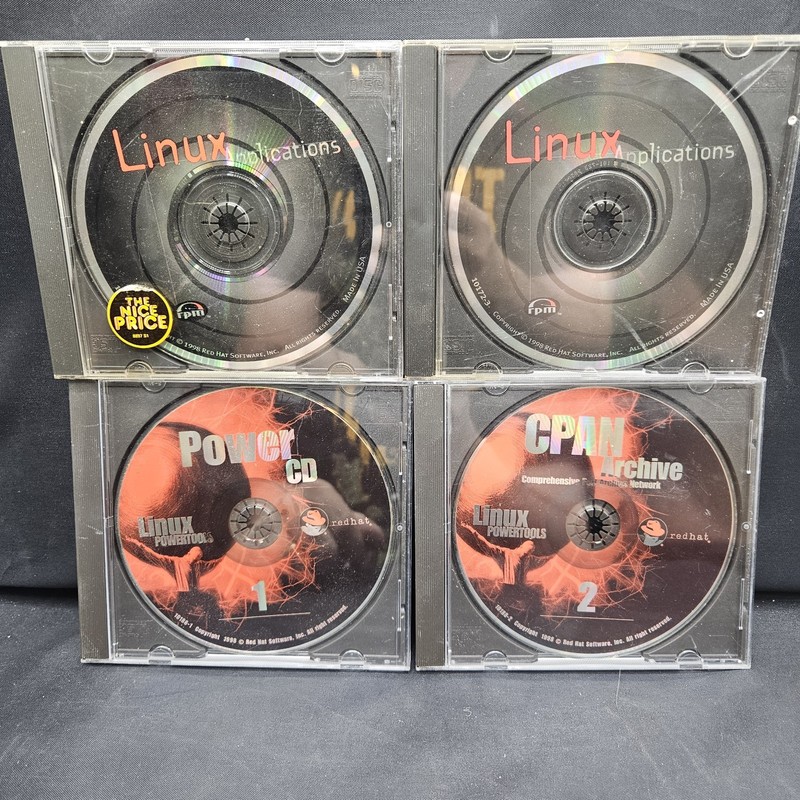 Lot of Red hat Linux CDs Power CD Cpan Archive Applications
