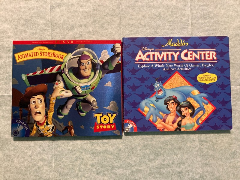 Lot Of 2 Disney Animated Storybook Toy Story - Aladdin CD-ROMs Windows Or Mac
