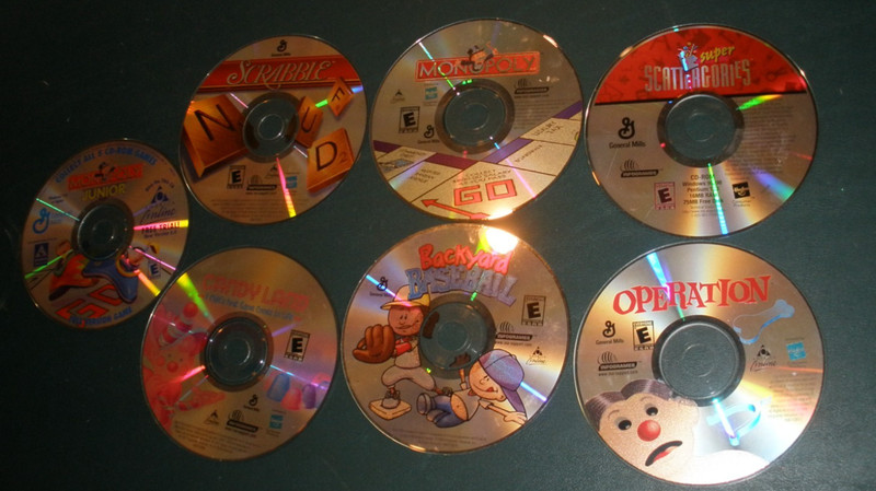 7 General Mills CD Games Monopoly Jr Scrabble Operation CandyLand Backyard Baseb