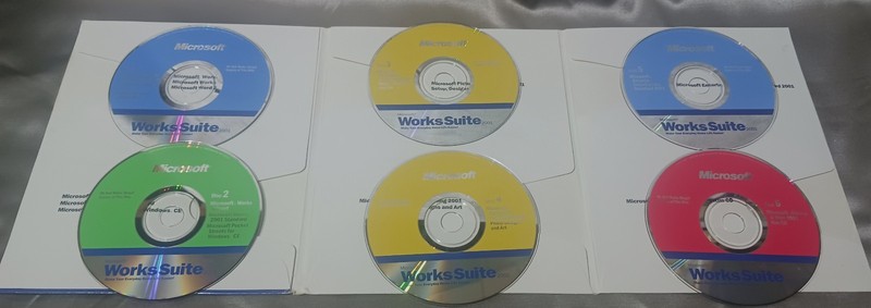 MICROSOFT WORKS SUITE 2001: "Pre-Owned 6 CD ROM Set" For Windows 95, 98 & 2000 gallery