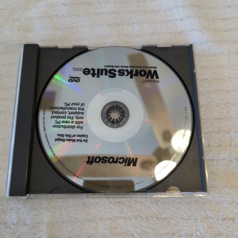 Microsoft Works Suite 2001 Set Up Disc With Certificate Of Authenticaty Case gallery