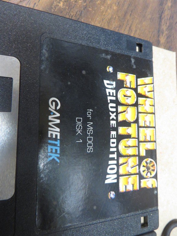 VINTAGE SOFTWARE 2 FLOPPY DISCS WHEEEL OF FORTUNE + THE SCARLET LETTER gallery