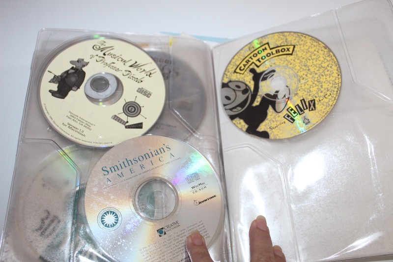 Vintage Apple Macintosh Compact Discs 6218cd Vinyl CD Gray Cases with 9 Discs gallery