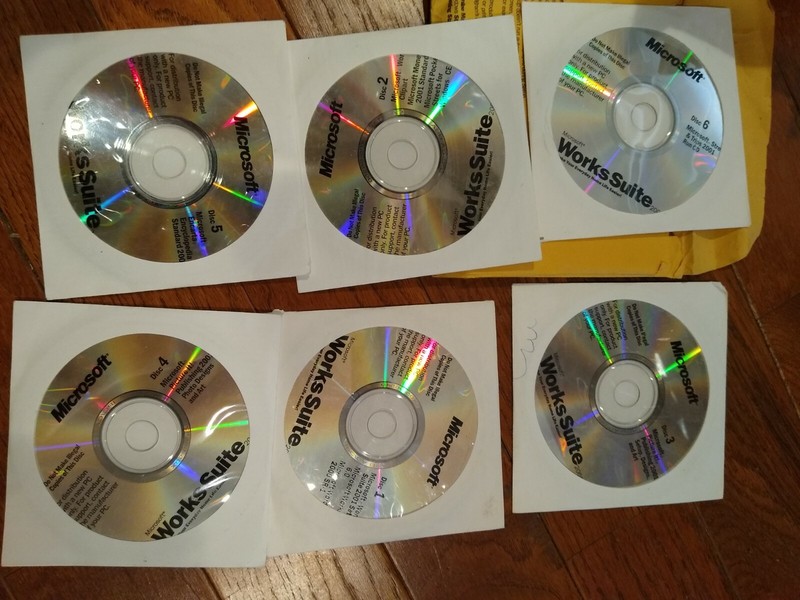 MicroSoft Works Suite 2001 w Product Key - 6 Disc Set w Encarta gallery