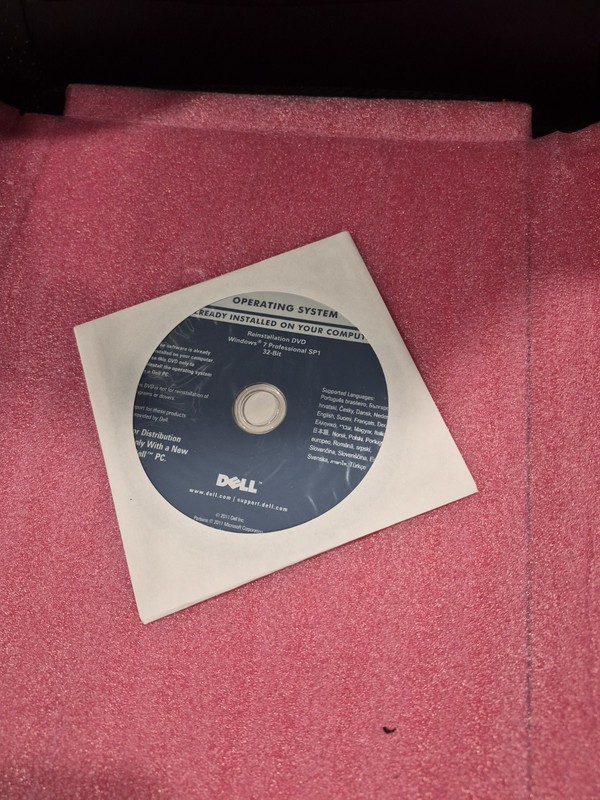 Dell Windows 7 Professional Reinstallation DVD 32 bit SP1 OS Dell P/N 04DTND New