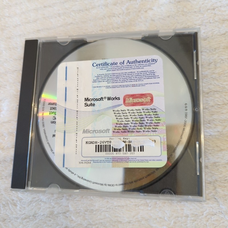 Microsoft Works Suite 2001 Set Up Disc With Certificate Of Authenticaty Case