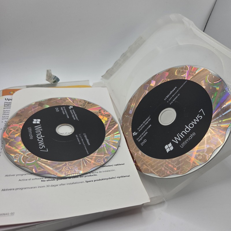 Microsoft Windows 7 Ultimate 32 & 64 Bit DVDs Genuine W/ Key - Case Damage gallery