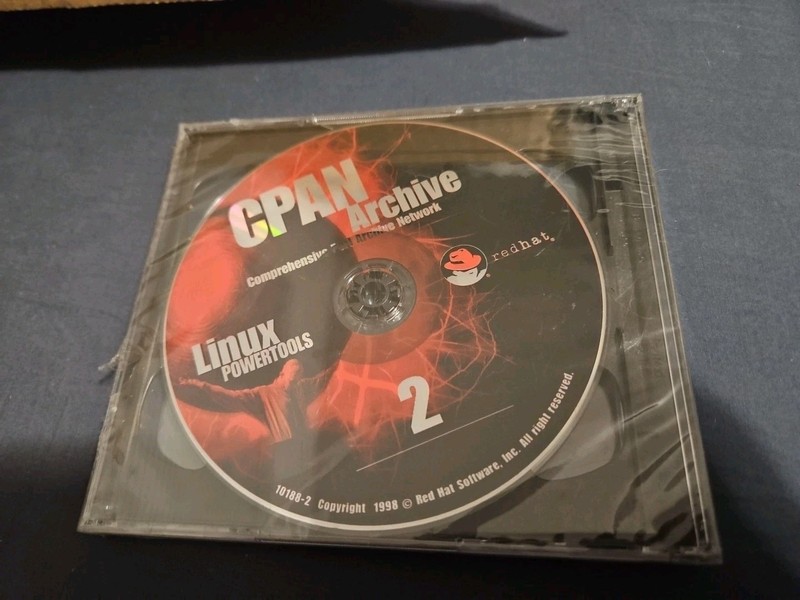 Rare VINTAGE Red Hat ~ LINUX POWER CD S0188-1 -2 CPAN ARCHIVE LINUX POWERTOOLS gallery