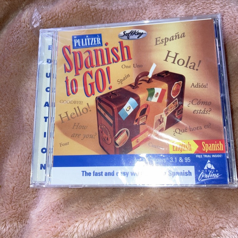 RXL Pulitzer Spanish to Go! (Vintage PC CD-ROM, 1998)