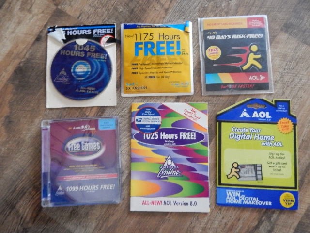 Vintage AOL America Online: 28 Promo Discs, 2 Pins, CAT Shirt, #40 Race Car RARE gallery